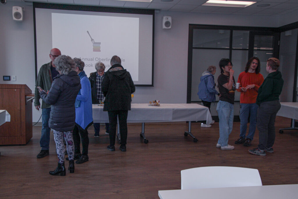 Attendees viewing entry displays or gathered in conversation.