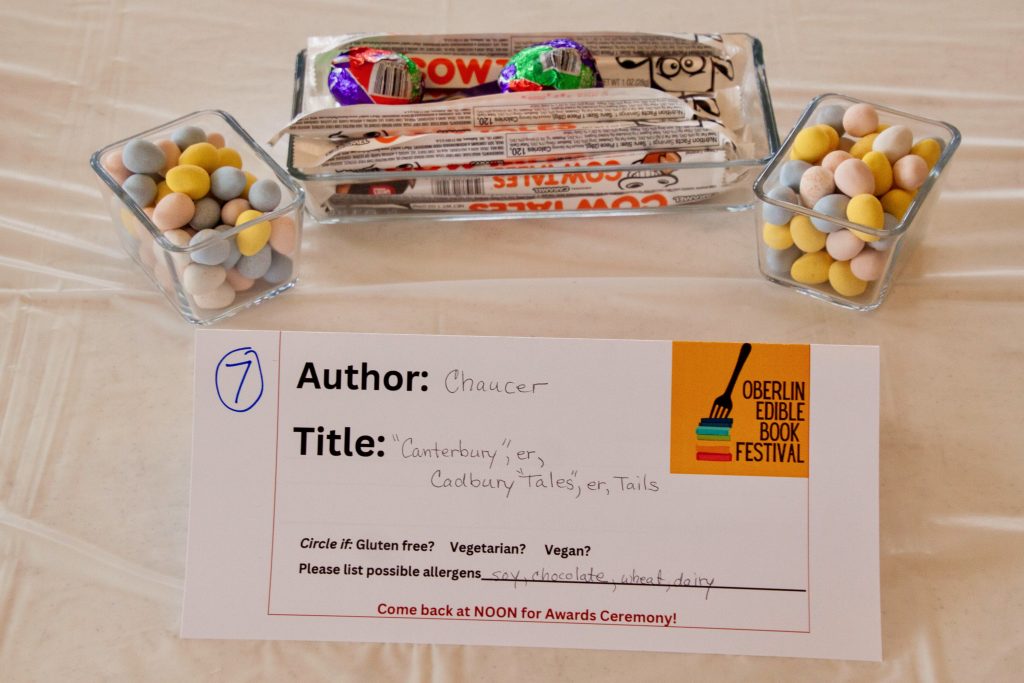 Photo of submission titled, "Canterbury, er, Cadbury Tales, er, Tails" featuring a two dishes of small egg shaped candies and a larger dish with Cadbury Eggs and Cowtales candies.