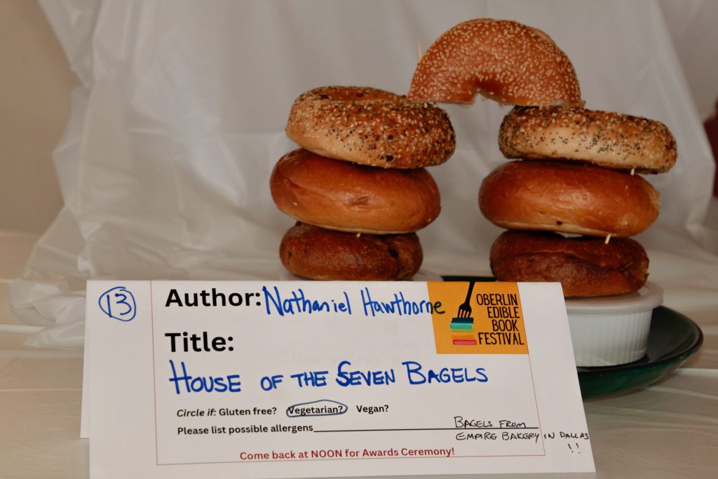 Photo of submission titled, "House of the Seven Bagels" featuring seven bagels arranged in an archway