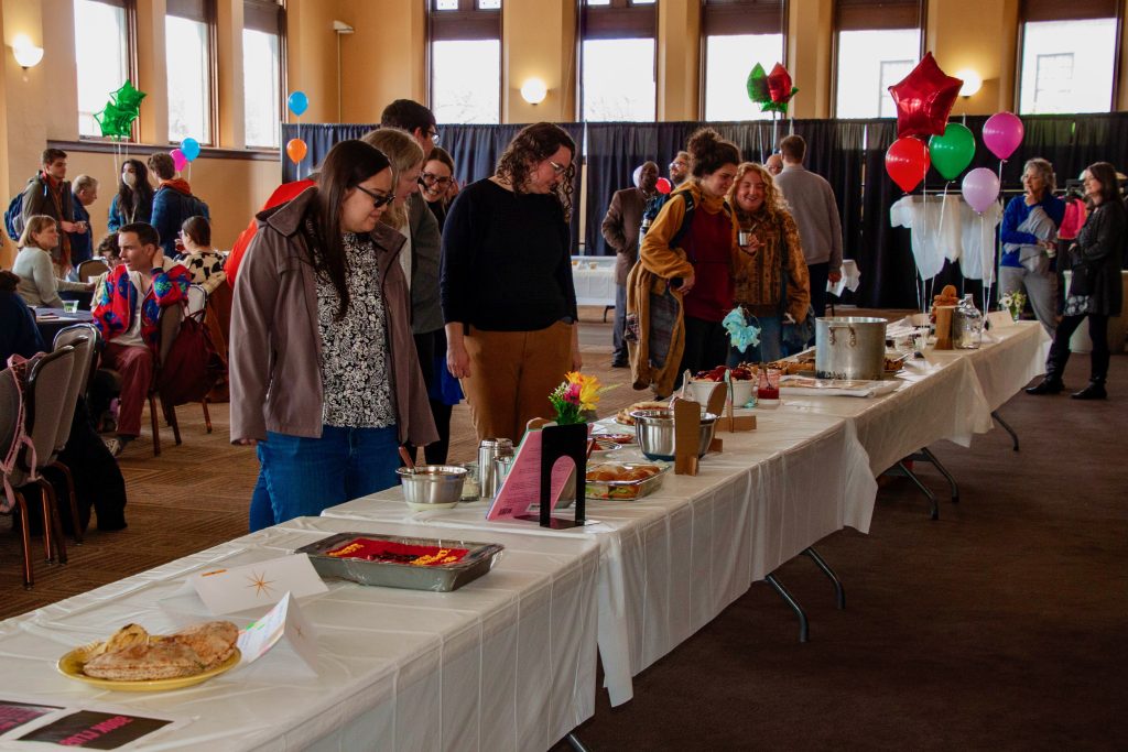 Attendees view the Edible Book Festival submissions
