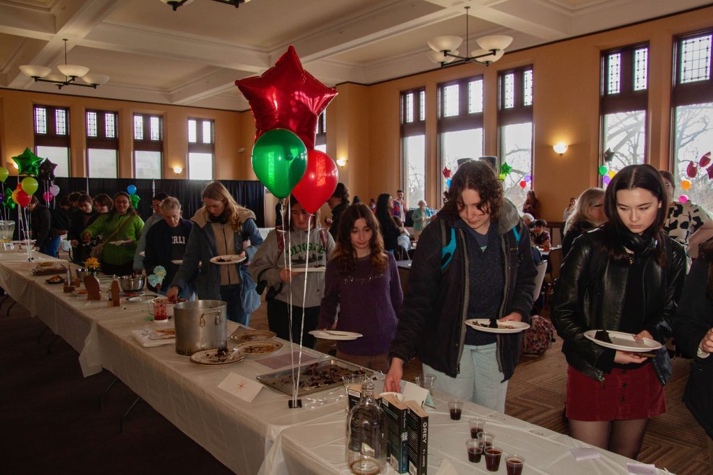 Attendees view the Edible Book Festival submissions